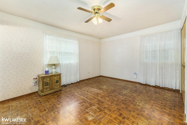 3480 Devonshire St, Sterling Heights, MI 48310 - empty room featuring ceiling fan and wallpapered walls