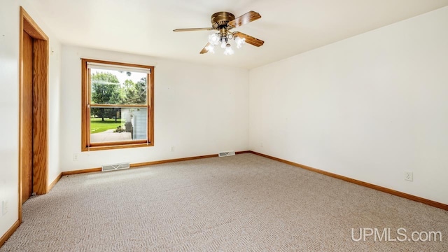 160 N Pyle Dr, Kingsford, MI 49802 - unfurnished room with a ceiling fan and carpet flooring
