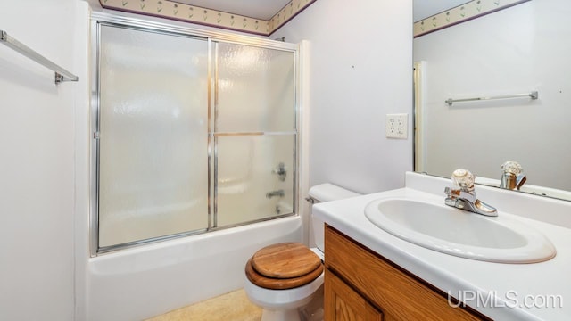 160 N Pyle Dr, Kingsford, MI 49802 - bathroom featuring vanity and shower / bath combination with glass door
