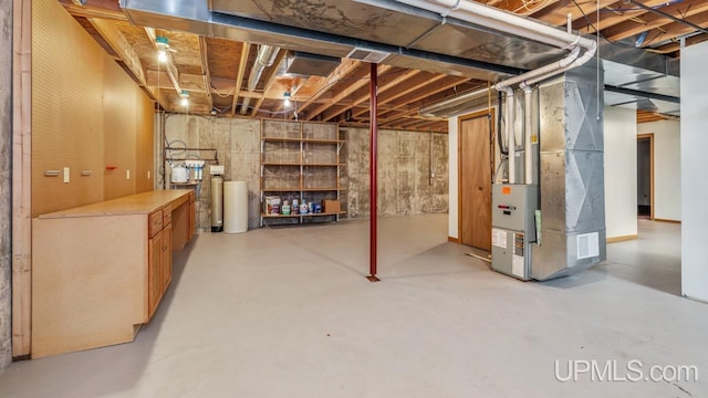 160 N Pyle Dr, Kingsford, MI 49802 - unfinished basement with a water softener system and heating unit