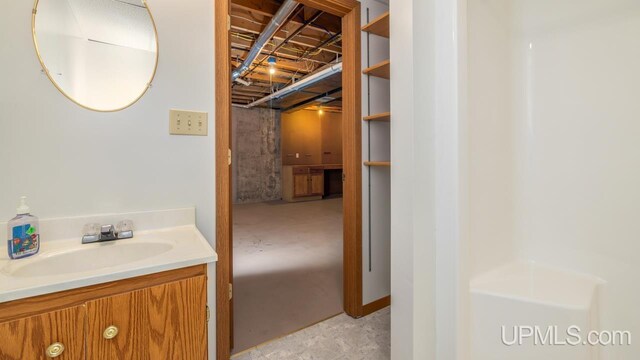 160 N Pyle Dr, Kingsford, MI 49802 - bathroom featuring vanity and concrete flooring