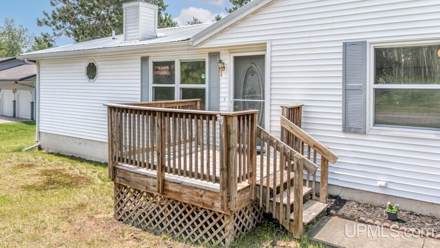 160 N Pyle Dr, Kingsford, MI 49802 - deck featuring a lawn