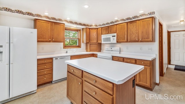 160 N Pyle Dr, Kingsford, MI 49802 - kitchen featuring white appliances, brown cabinets, light countertops, and recessed lighting
