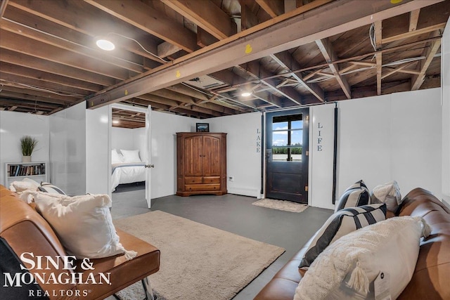 2727 Horseshoe Lake Rd, West Branch, MI 48661 - living room featuring concrete flooring