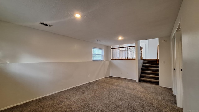 4130 Elmhurst Rd, Waterford, MI 48328 - basement featuring dark colored carpet, stairway, and recessed lighting