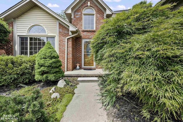 23875 Settlers Dr, Macomb Twp, MI 48042 - view of front of house featuring brick siding