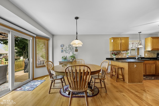 23875 Settlers Dr, Macomb Twp, MI 48042 - dining room featuring light wood-style flooring