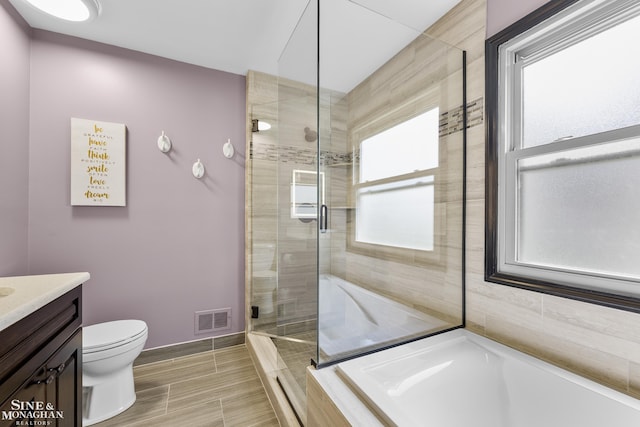 23875 Settlers Dr, Macomb Twp, MI 48042 - bathroom with vanity, a stall shower, and a bath