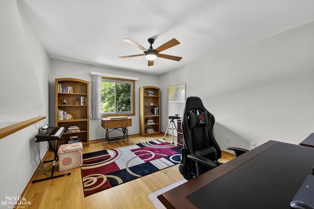 23875 Settlers Dr, Macomb Twp, MI 48042 - office area with ceiling fan and wood finished floors