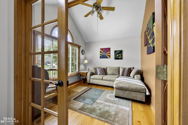 23875 Settlers Dr, Macomb Twp, MI 48042 - living room featuring wood finished floors, lofted ceiling, and a ceiling fan