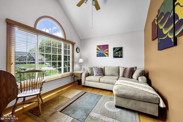 23875 Settlers Dr, Macomb Twp, MI 48042 - living room featuring plenty of natural light, wood finished floors, a ceiling fan, and high vaulted ceiling