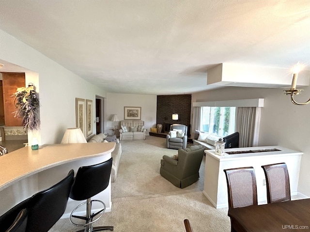 2010 Deer Lake Ave, Ishpeming, MI 49849 - living area featuring light colored carpet, a fireplace, and a desk