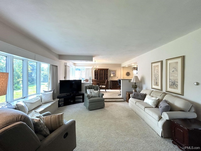 2010 Deer Lake Ave, Ishpeming, MI 49849 - living room with carpet flooring and a chandelier