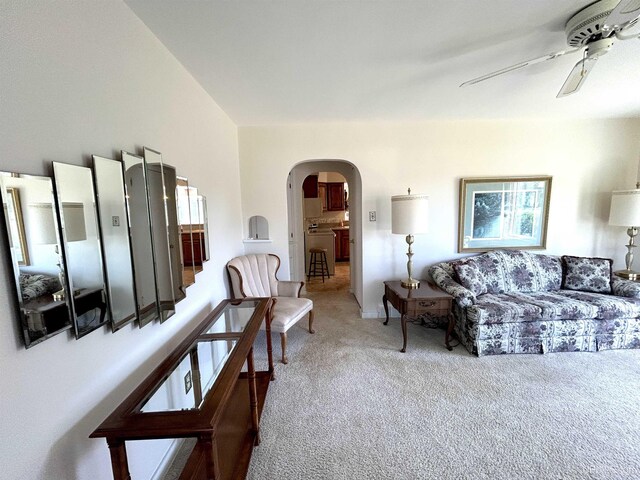2010 Deer Lake Ave, Ishpeming, MI 49849 - carpeted living room featuring arched walkways and ceiling fan