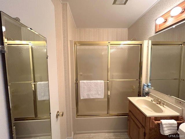 2010 Deer Lake Ave, Ishpeming, MI 49849 - bathroom featuring bath / shower combo with glass door, vanity, and wallpapered walls