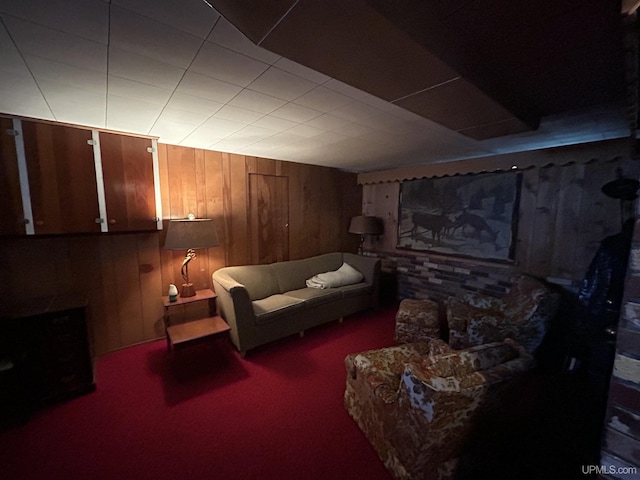 2010 Deer Lake Ave, Ishpeming, MI 49849 - living area with wood walls and carpet