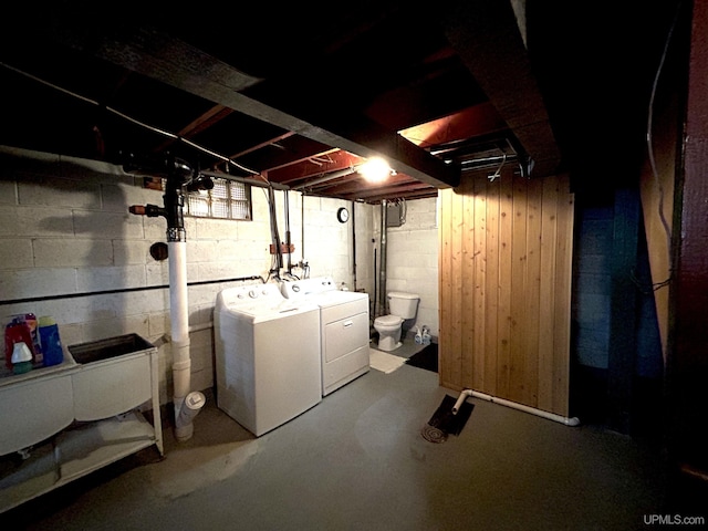 2010 Deer Lake Ave, Ishpeming, MI 49849 - unfinished below grade area featuring washing machine and clothes dryer