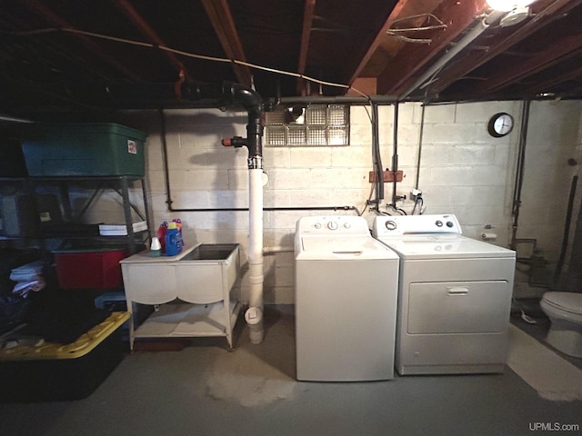 2010 Deer Lake Ave, Ishpeming, MI 49849 - unfinished basement with independent washer and dryer and a sink
