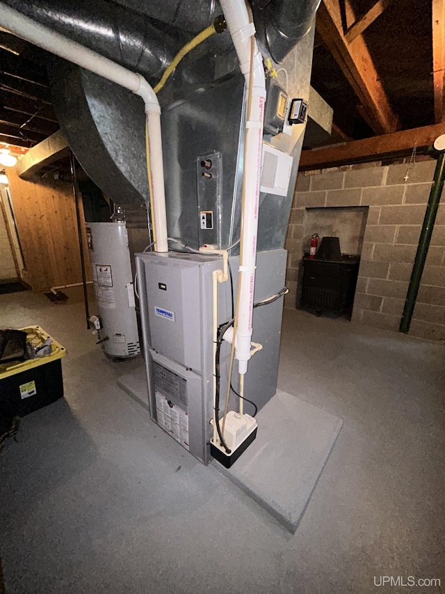 2010 Deer Lake Ave, Ishpeming, MI 49849 - utility room featuring water heater and heating unit