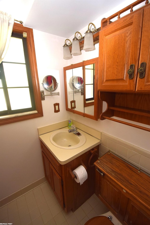 131 Cherryl Ln Unit 4, Algonac, MI 48001 - half bathroom featuring vanity and tile patterned flooring