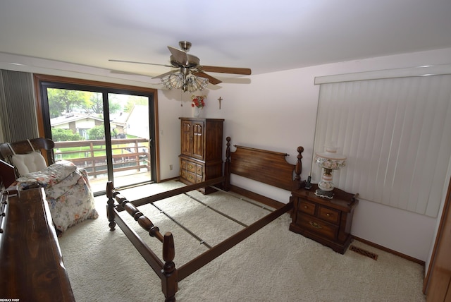 131 Cherryl Ln Unit 4, Algonac, MI 48001 - bedroom featuring access to exterior, carpet flooring, and ceiling fan