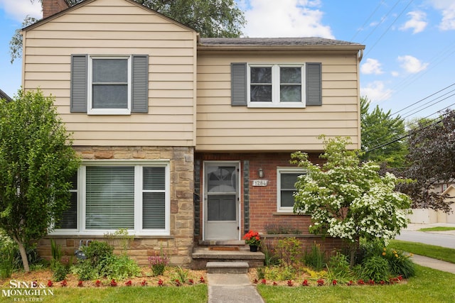 1284 Brys Dr, Grosse Pointe Woods, MI 48236 - view of front of property with a chimney and stone siding