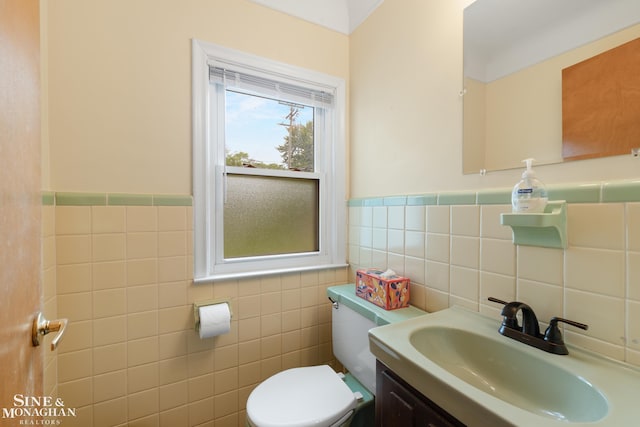 1284 Brys Dr, Grosse Pointe Woods, MI 48236 - bathroom with tile walls, vanity, and a wainscoted wall