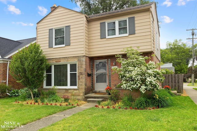 1284 Brys Dr, Grosse Pointe Woods, MI 48236 - view of front of house with stone siding, a chimney, and brick siding