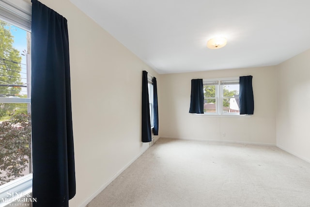 1284 Brys Dr, Grosse Pointe Woods, MI 48236 - carpeted empty room featuring baseboards