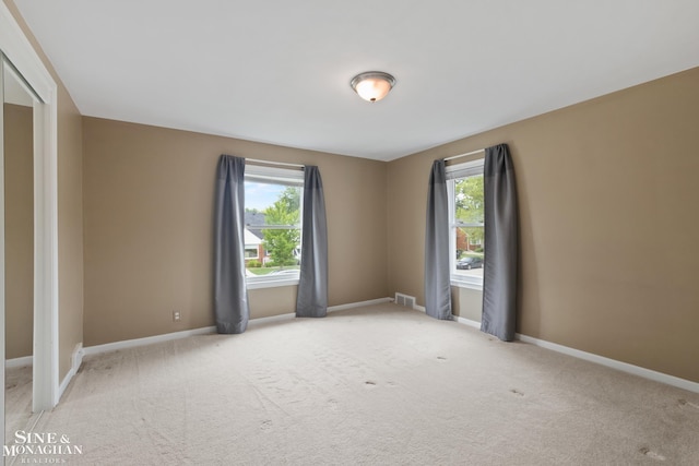 1284 Brys Dr, Grosse Pointe Woods, MI 48236 - empty room featuring carpet floors and baseboards