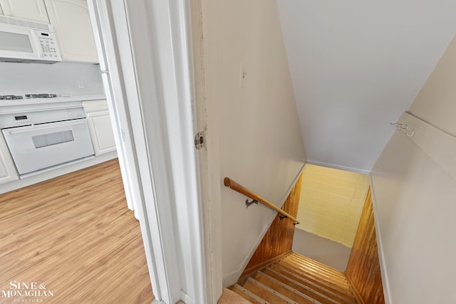 1284 Brys Dr, Grosse Pointe Woods, MI 48236 - staircase featuring wood finished floors