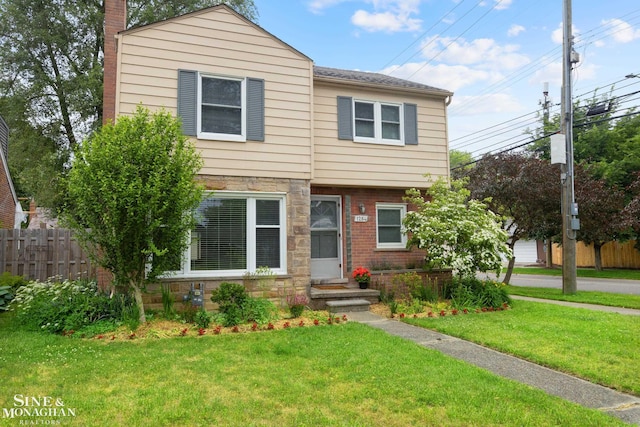 1284 Brys Dr, Grosse Pointe Woods, MI 48236 - view of front of property with a chimney and stone siding