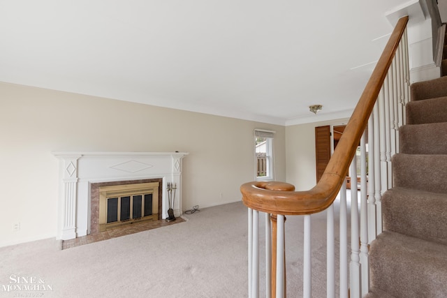 1284 Brys Dr, Grosse Pointe Woods, MI 48236 - stairway with carpet flooring and a fireplace with flush hearth