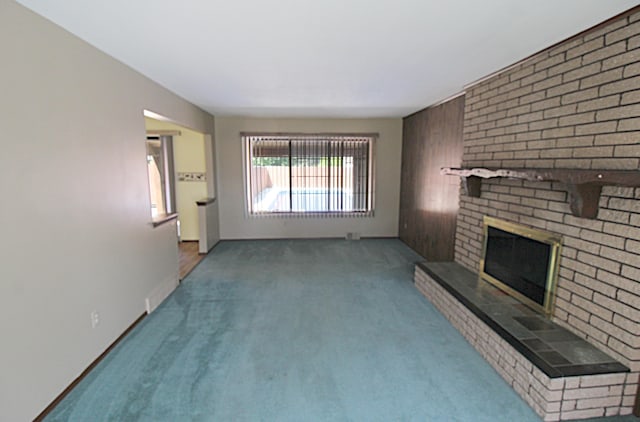 48501 E Ranch Dr, Chesterfield Twp, MI 48051 - unfurnished living room featuring carpet and a fireplace
