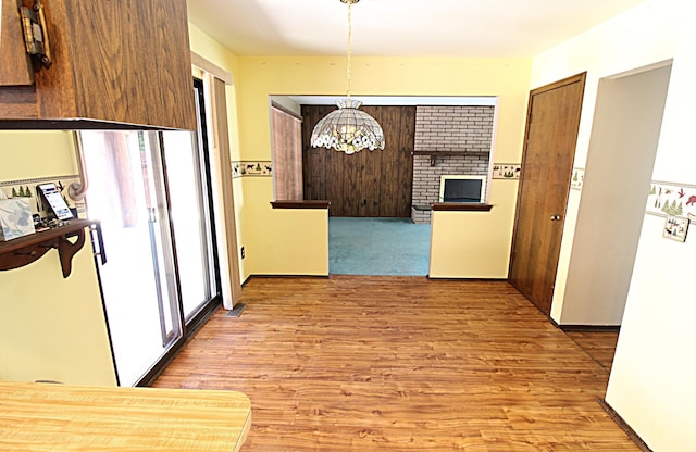 48501 E Ranch Dr, Chesterfield Twp, MI 48051 - kitchen with a chandelier, healthy amount of natural light, and light wood-type flooring