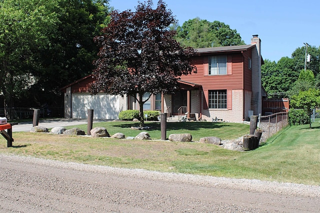 48501 E Ranch Dr, Chesterfield Twp, MI 48051 - view of front of home with a chimney, brick siding, and an attached garage