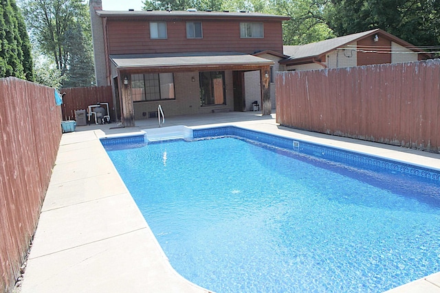 48501 E Ranch Dr, Chesterfield Twp, MI 48051 - view of pool with a patio area and a fenced backyard