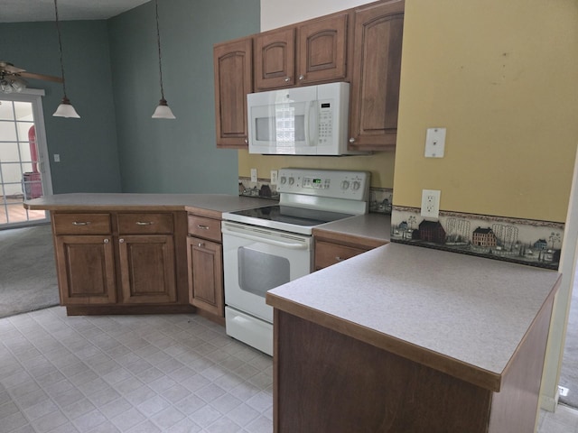 10505 N Athey Ave, Harrison, MI 48625 - kitchen featuring white appliances, a peninsula, decorative light fixtures, ceiling fan, and light tile patterned floors