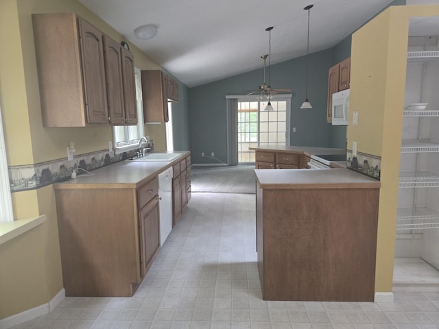 10505 N Athey Ave, Harrison, MI 48625 - kitchen featuring white appliances, vaulted ceiling, ceiling fan, pendant lighting, and light countertops