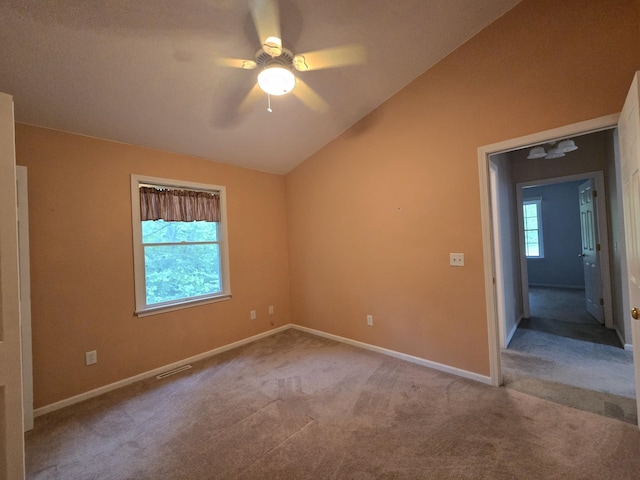 10505 N Athey Ave, Harrison, MI 48625 - carpeted empty room with a ceiling fan and lofted ceiling