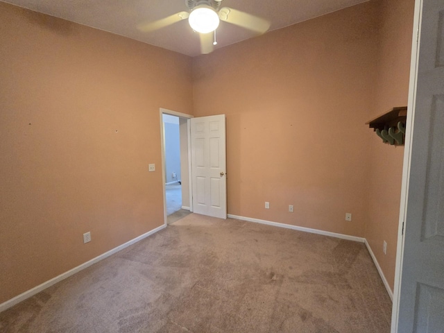 10505 N Athey Ave, Harrison, MI 48625 - spare room featuring a ceiling fan and carpet floors