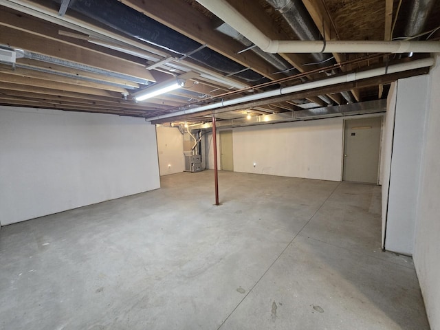 10505 N Athey Ave, Harrison, MI 48625 - unfinished below grade area with heating unit