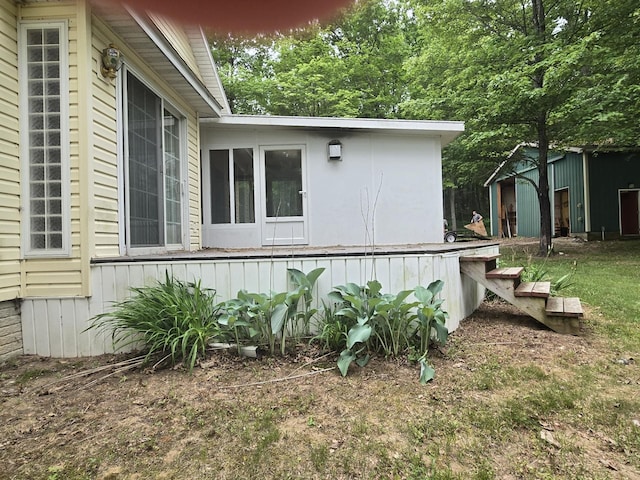 10505 N Athey Ave, Harrison, MI 48625 - view of side of property with a storage shed