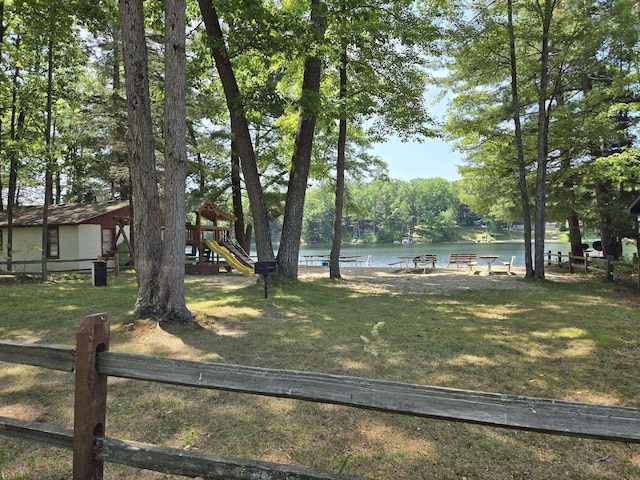 10505 N Athey Ave, Harrison, MI 48625 - view of yard with a playground and a water view