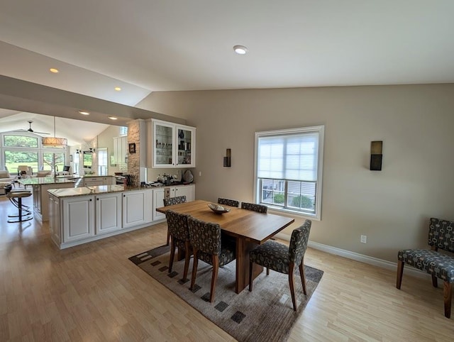 5953 Qwinn Ct, Bay City, MI 48706 - dining area with vaulted ceiling, light wood-type flooring, and recessed lighting