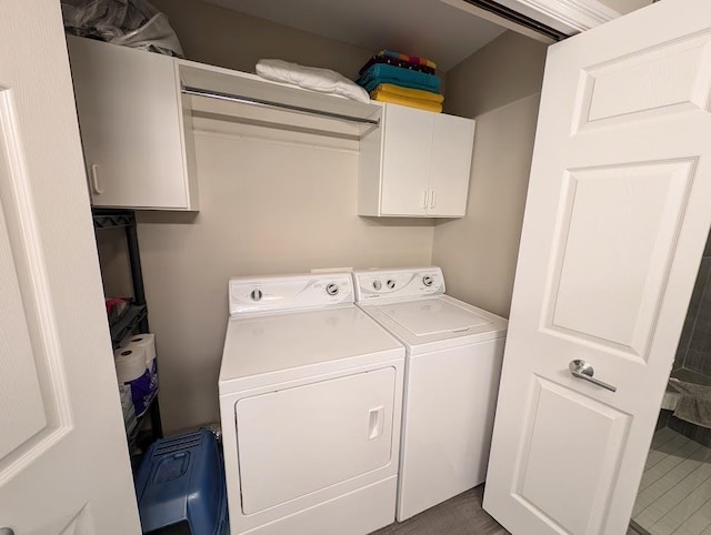5953 Qwinn Ct, Bay City, MI 48706 - laundry area featuring cabinet space and washer and dryer