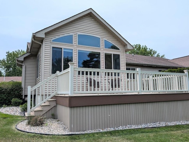5953 Qwinn Ct, Bay City, MI 48706 - rear view of property with a wooden deck and stairway