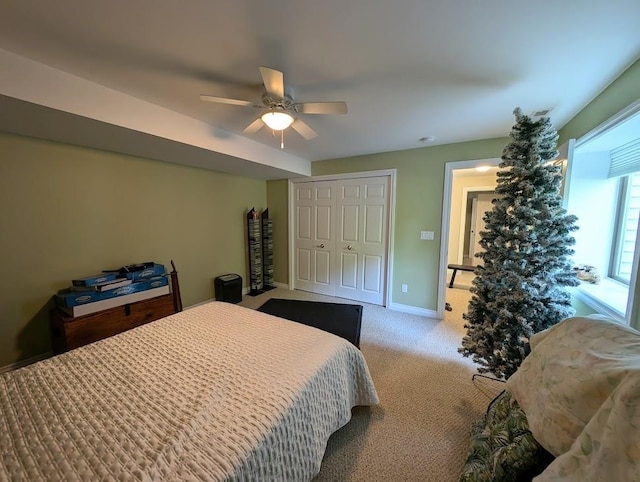 5953 Qwinn Ct, Bay City, MI 48706 - carpeted bedroom featuring a closet and ceiling fan