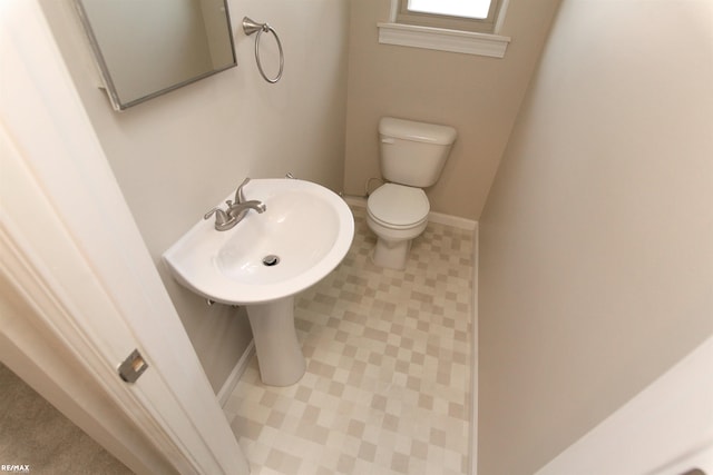 31717 Tecla St, Warren, MI 48088 - bathroom featuring baseboards and toilet