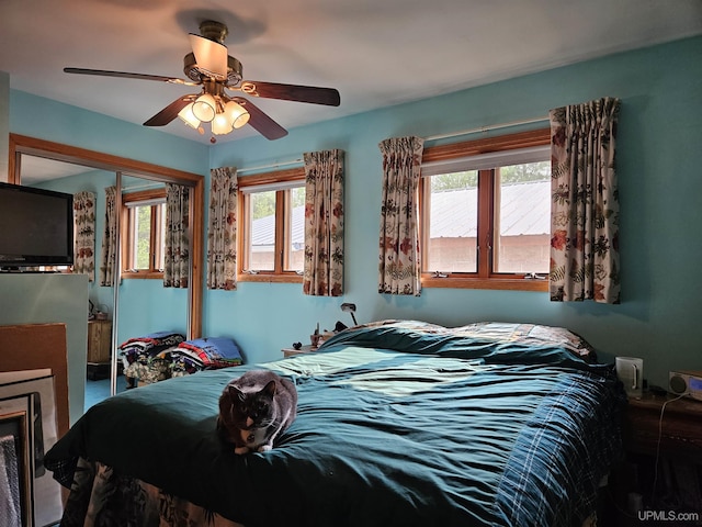 505 Pennsylvania Ave, Ontonagon, MI 49953 - bedroom with a closet and ceiling fan